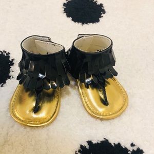 Gladiator fringe sandals.